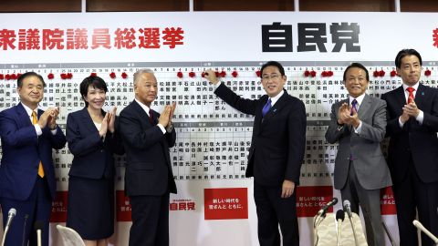 Japan's Prime Minister and ruling Liberal Democratic Party leader Fumio Kishida with key party members at the party headquarters on October 31 in Tokyo, Japan. 