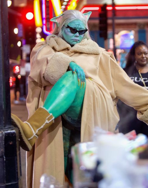 Lizzo painted herself green, pulled on a pair of Uggs and wore a tan cloak as Baby Yoda from "The Mandalorian."<br />