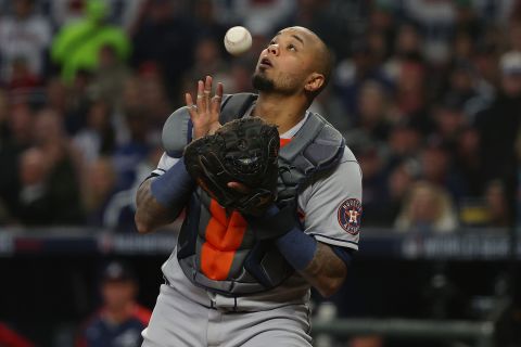 Martin Maldonado of the Astros catches a pop fly during the fourth inning of Game 5.