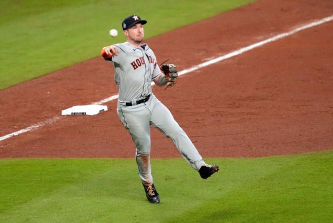 Astros third baseman Alex Bregman throws to first base for the out during Game 5 on Sunday, October 31.