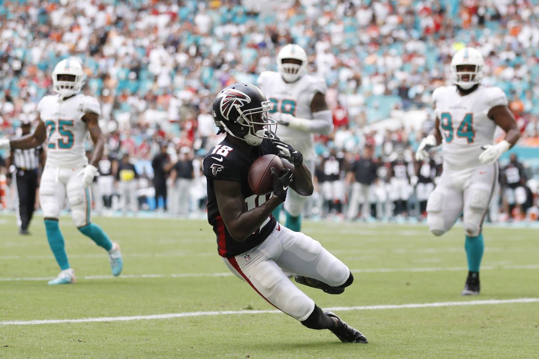 Ridley catches a touchdown pass during the second quarter against the Miami Dolphins on October 24. 