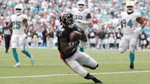 Ridley catches a touchdown pass during the second quarter against the Miami Dolphins on October 24. 