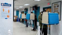 Voters fill out their ballots at an early voting center at the Mount Vernon Governmental Center on October 31, 2020 in Alexandria, Virginia. 