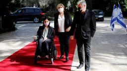 Karine Elharrar, left, Orna Barbivai and Meir Cohen from the Yesh Atid party arrive for consultations on the formation of a coalition government, at the President's residence in Jerusalem April 5, 2021. 