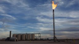 A gas flare burns at a Matador Resources Co. site in the Permian Basin area of Loving County, Texas, on Dec. 15, 2018. 