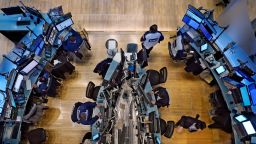 Traders work on the floor of the New York Stock Exchange, Monday, Nov. 1, 2021. Stocks wobbled in afternoon trading on Wall Street Monday and hovered around the record highs set the week before. (AP Photo/Richard Drew)