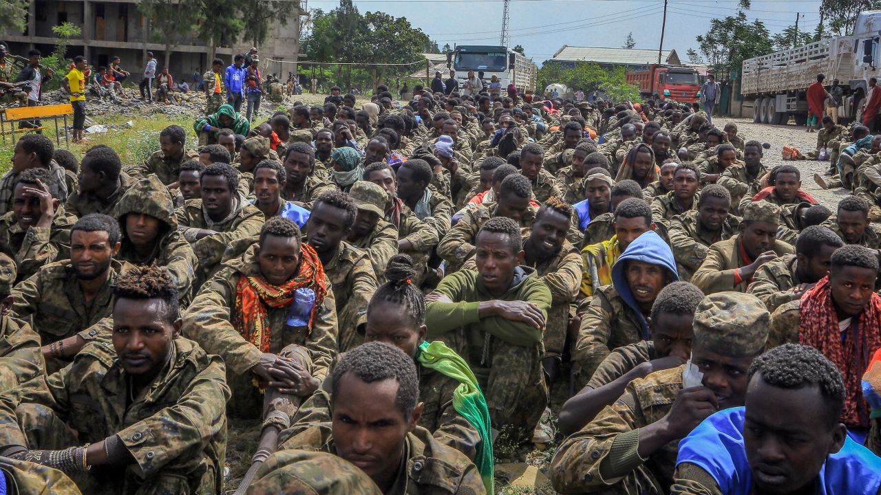 Captured Ethiopian government soldiers and allied militia members sit in rows after being paraded by Tigray forces in Mekele, the capital of the Tigray region.