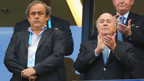 Then UEFA President Michel Platini (L) and FIFA President Joseph Blatter look on during the 2014 FIFA World Cup.