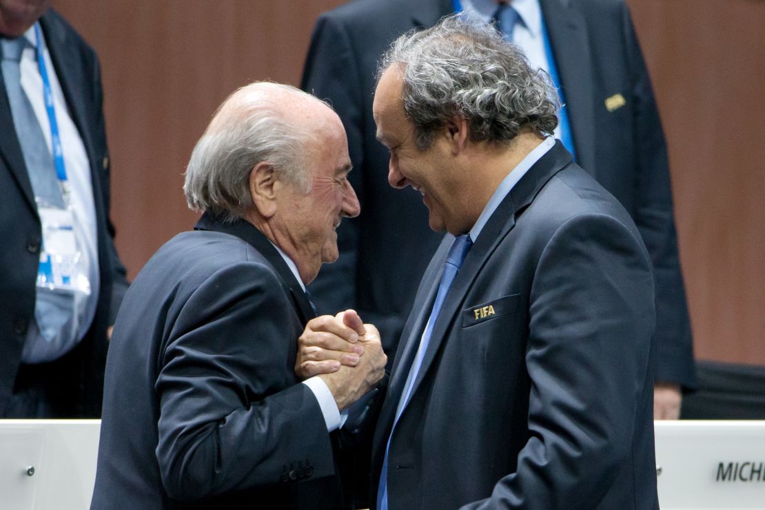 Then-FIFA President Sepp Blatter shakes hands with then-UEFA president Michel Platini during the 65th FIFA Congress on May 29, 2015 in Zurich, Switzerland.