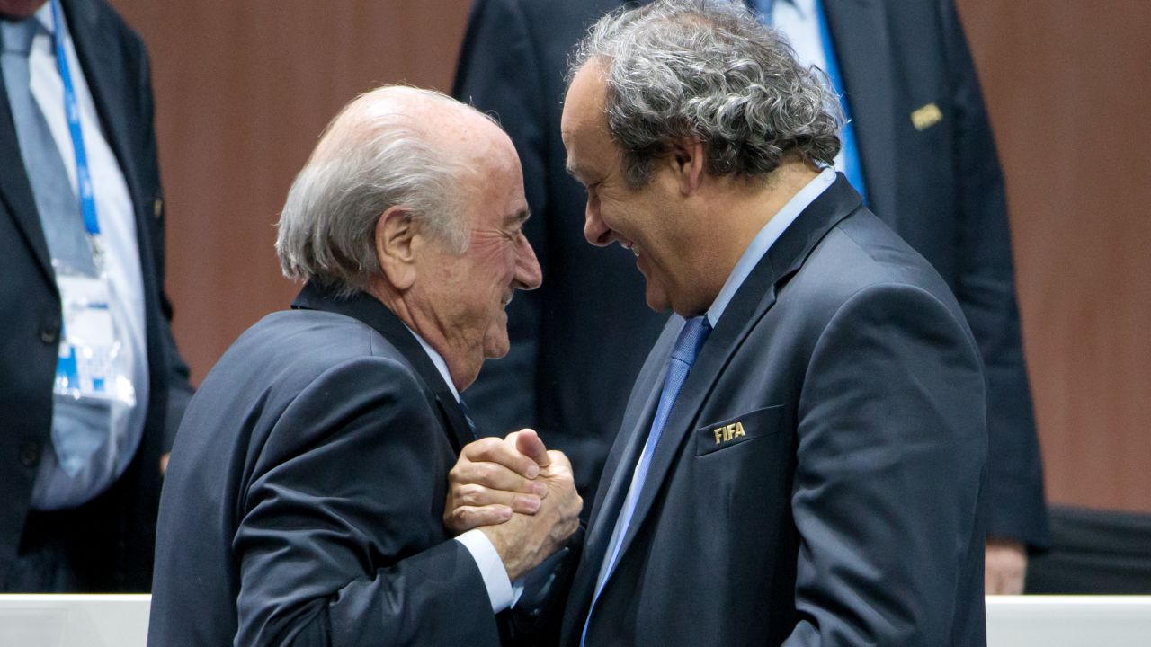 Then-FIFA President Sepp Blatter shakes hands with then-UEFA president Michel Platini during the 65th FIFA Congress on May 29, 2015 in Zurich, Switzerland.