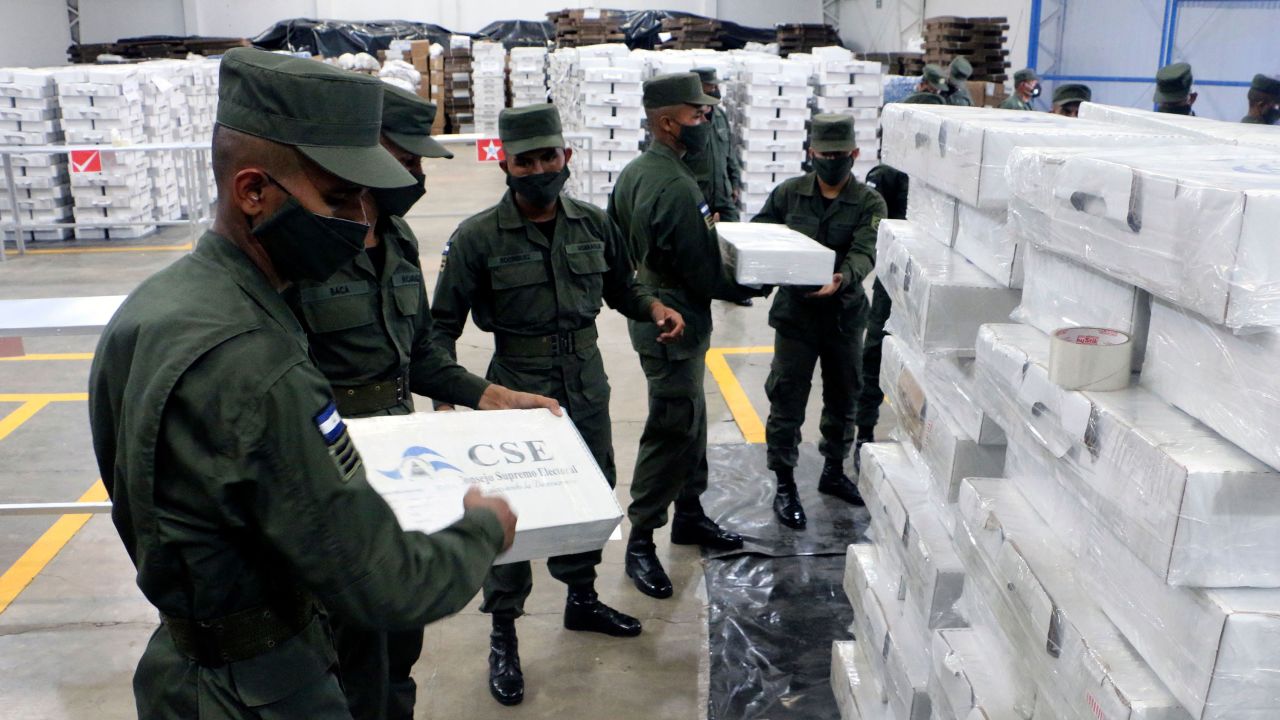Members of Nicaragua's army prepare election ballots for their distribution throughout the country.