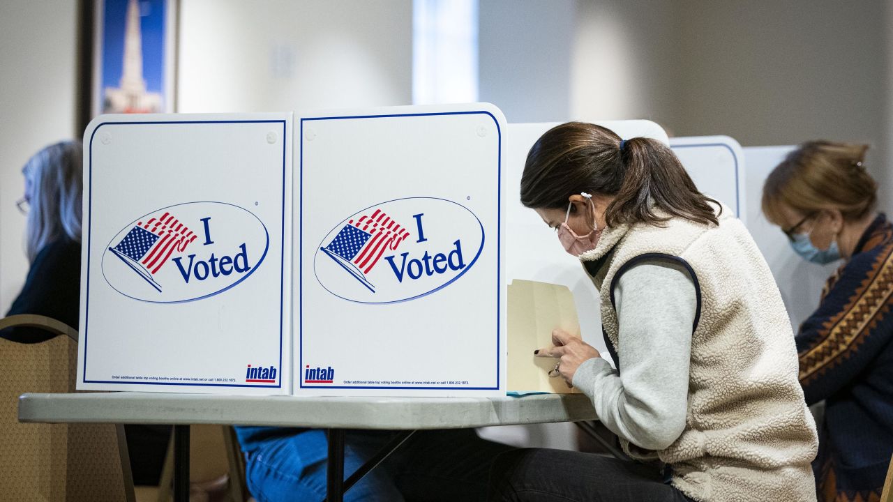 Voter cast ballots at a polling location in Alexandria, Virginia, U.S., on Tuesday, Nov. 2, 2021.