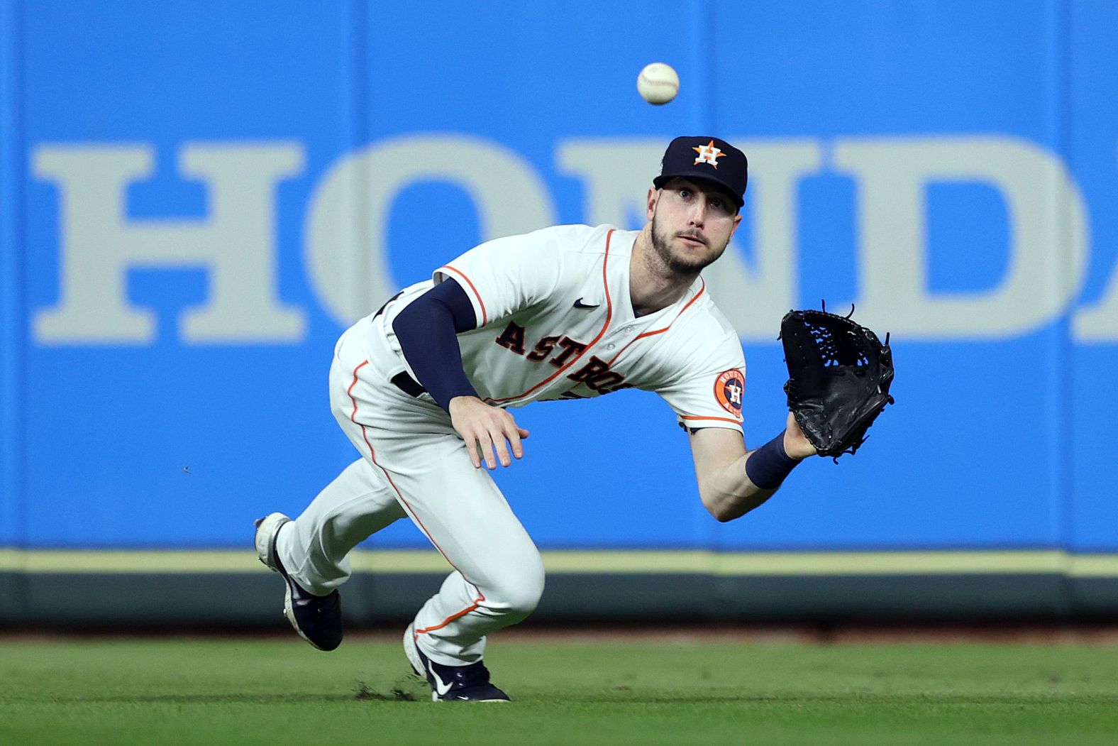 Astros right fielder Kyle Tucker catches a line drive for an out.