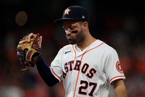 Astros second baseman Jose Altuve walks to the dugout during the seventh inning.