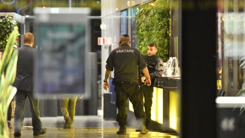 Security guards are seen at the concert hall in Uppsala on November 2.