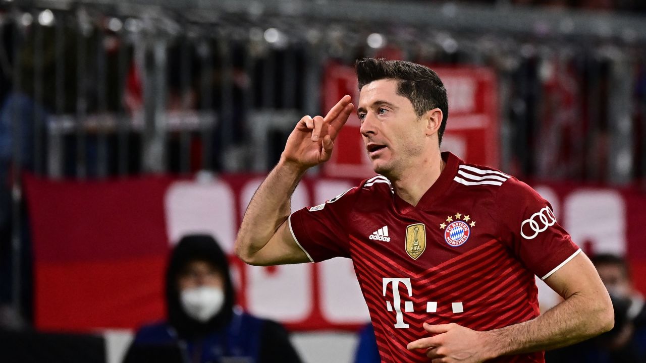 Bayern Munich's forward Robert Lewandowski celebrates scoring his team's fourth goal against Benfica.