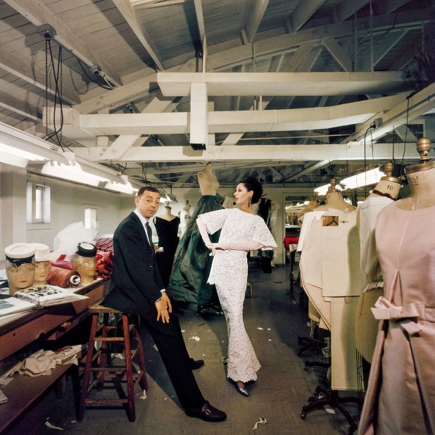 American fashion designer James Galanos with the model Dovima at his New York atelier in 1960.