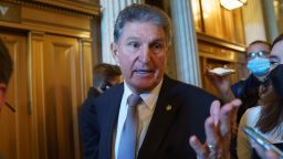 Sen. Joe Manchin, D-WVa., who has been a key holdout on President Joe Biden's ambitious domestic package, is surrounded by reporters as he leaves the chamber after a vote, at the Capitol in Washington, Wednesday, Nov. 3, 2021. 