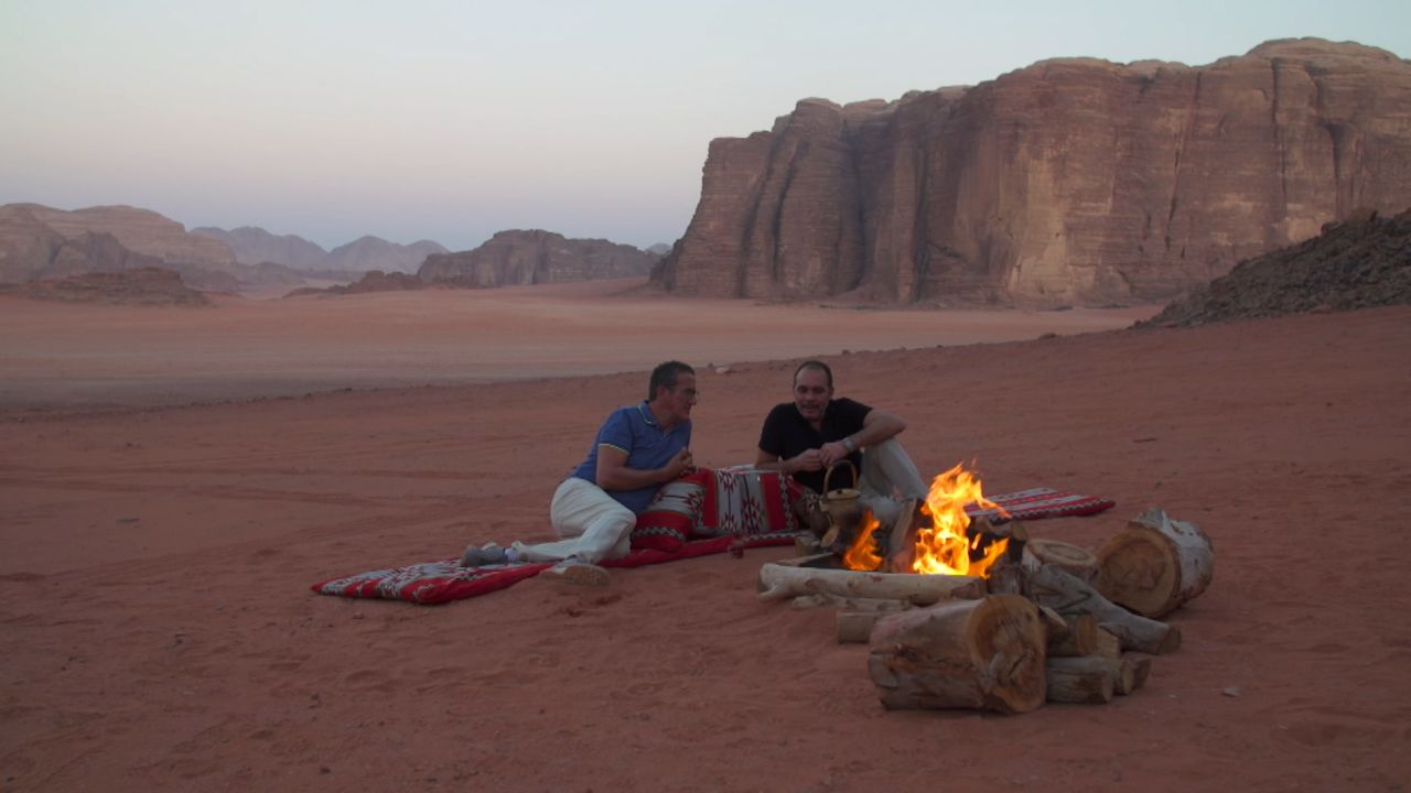 Richard Quest sits by a campfire with Prince Ali Bin Al Hussein of Jordan in his country's Wadi Rum desert.