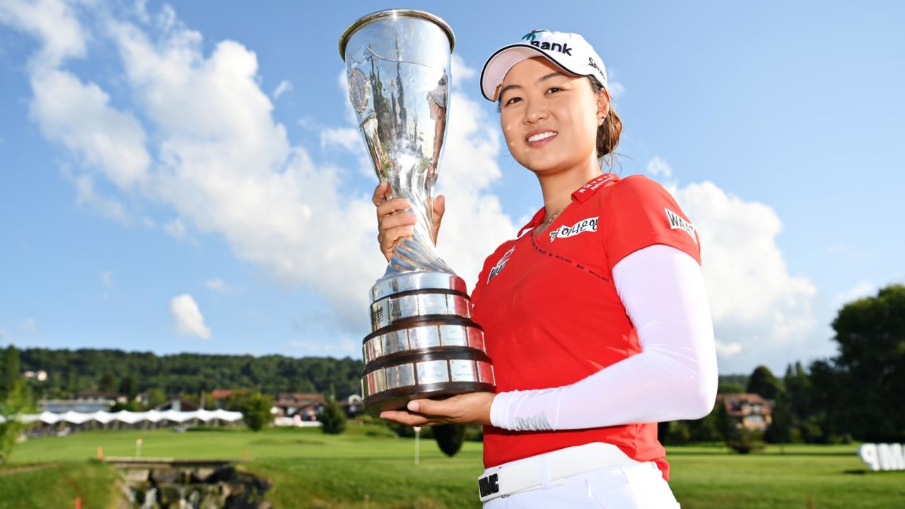 EVIAN-LES-BAINS, FRANCE - JULY 25: Tournament winner Minjee Lee of Australia poses for a photo with her trophy during day four of the The Amundi Evian Championship at Evian Resort Golf Club on July 25, 2021 in Evian-les-Bains, France. (Photo by Stuart Franklin/Getty Images)