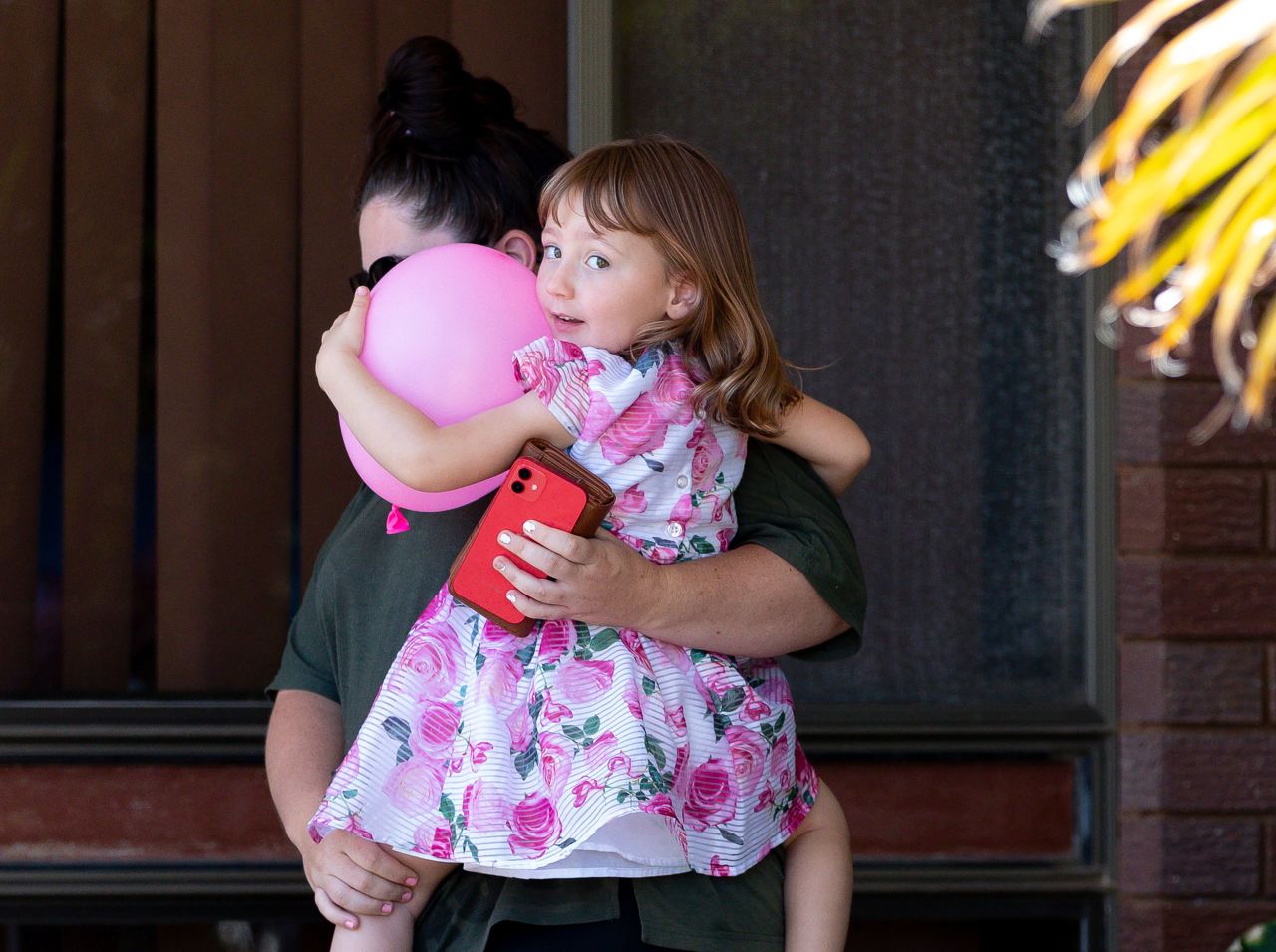 Cleo Smith and her mother Ellie Smith leave a house where they spent the night after the 4-year-old was rescued in Carnarvon, Australia, on Thursday, November 4. <a href="https://www.cnn.com/2021/11/04/world/cleo-smith-man-charged-intl-hnk/index.html" target="_blank">Cleo was found by police</a> in the early hours of November 3 in a locked house in Carnarvon, a town in the state of Western Australia, some 30 miles from the campsite where she was apparently abducted close to three weeks ago. Terence Kelly was charged with various offenses including "forcibly taking a child under 16."