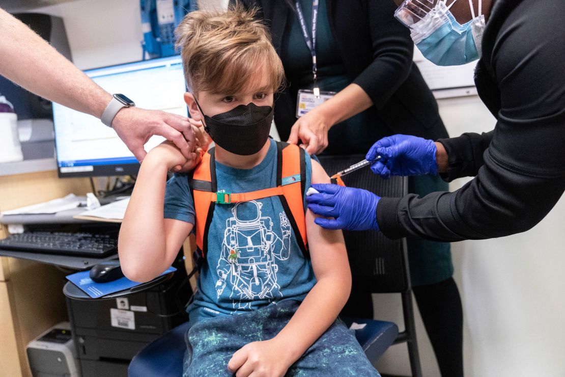 A nurse inoculates an 8-year-old child at NYC Health + Hospitals Harlem Hospital on November 4, 2021. 