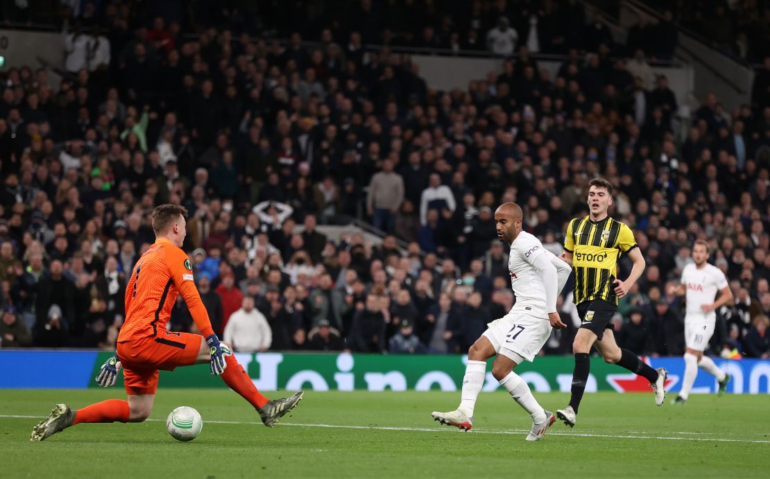 Lucas Moura scores Tottenham's second goal past Markus Schubert.