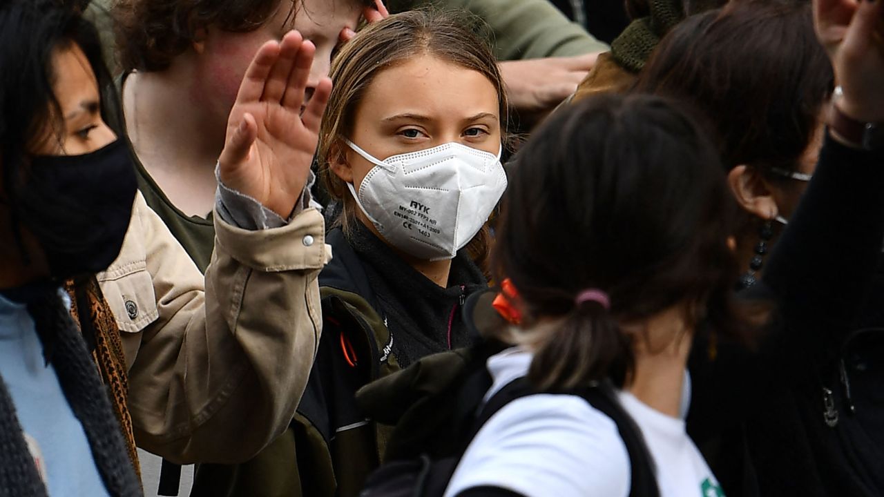Swedish climate activist Greta Thunberg joins a march.