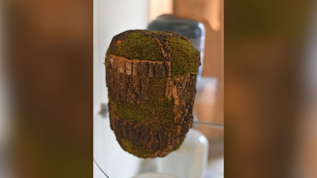 Biodegradable urns are becoming increasingly popular. The urn pictured is made from cork oak wood, for sale in Germany.