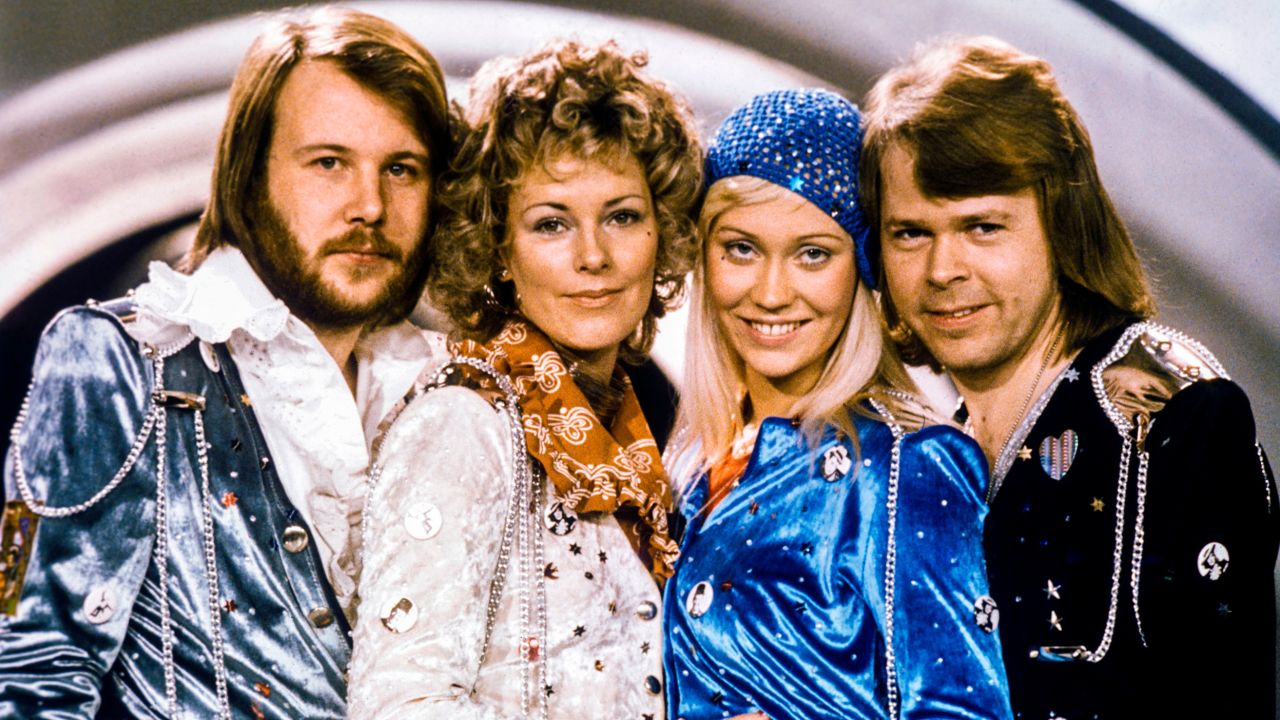 ABBA members (L-R) Benny Andersson, Anni-Frid Lyngstad, Agnetha Fältskog and Björn Ulvaeus pose after winning the Swedish round of the Eurovision Song Contest with their song "Waterloo" in Stockholm in 1974.