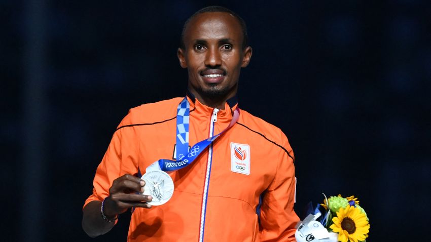 Silver medallist Netherlands' Abdi Nageeye poses during the victory ceremony of the men's marathon event during the Tokyo 2020 Olympic Games at the Olympic Stadium in Tokyo on August 8, 2021. (Photo by Adek BERRY / AFP) (Photo by ADEK BERRY/AFP via Getty Images)