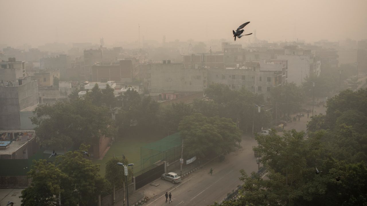 Morning haze envelops the skyline in New Delhi, India, on Friday, November 5.