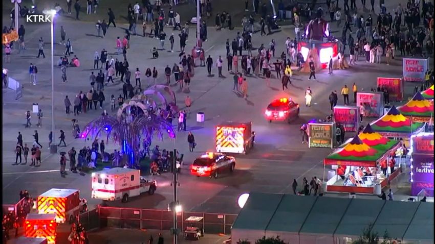 Ambulances arrive on the scene after a stampede at the Astroworld Festival in Houston.