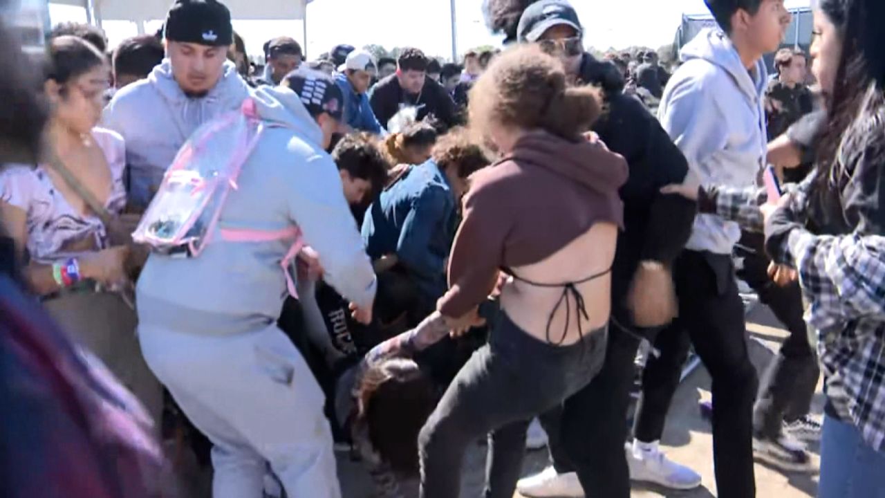 People rush entrance at Astroworld on Friday.