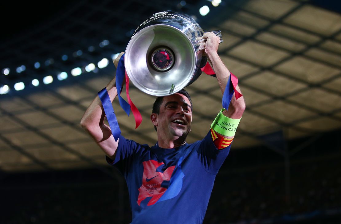 Xavi celebrates winning the Champions League with Barcelona in 2015. 