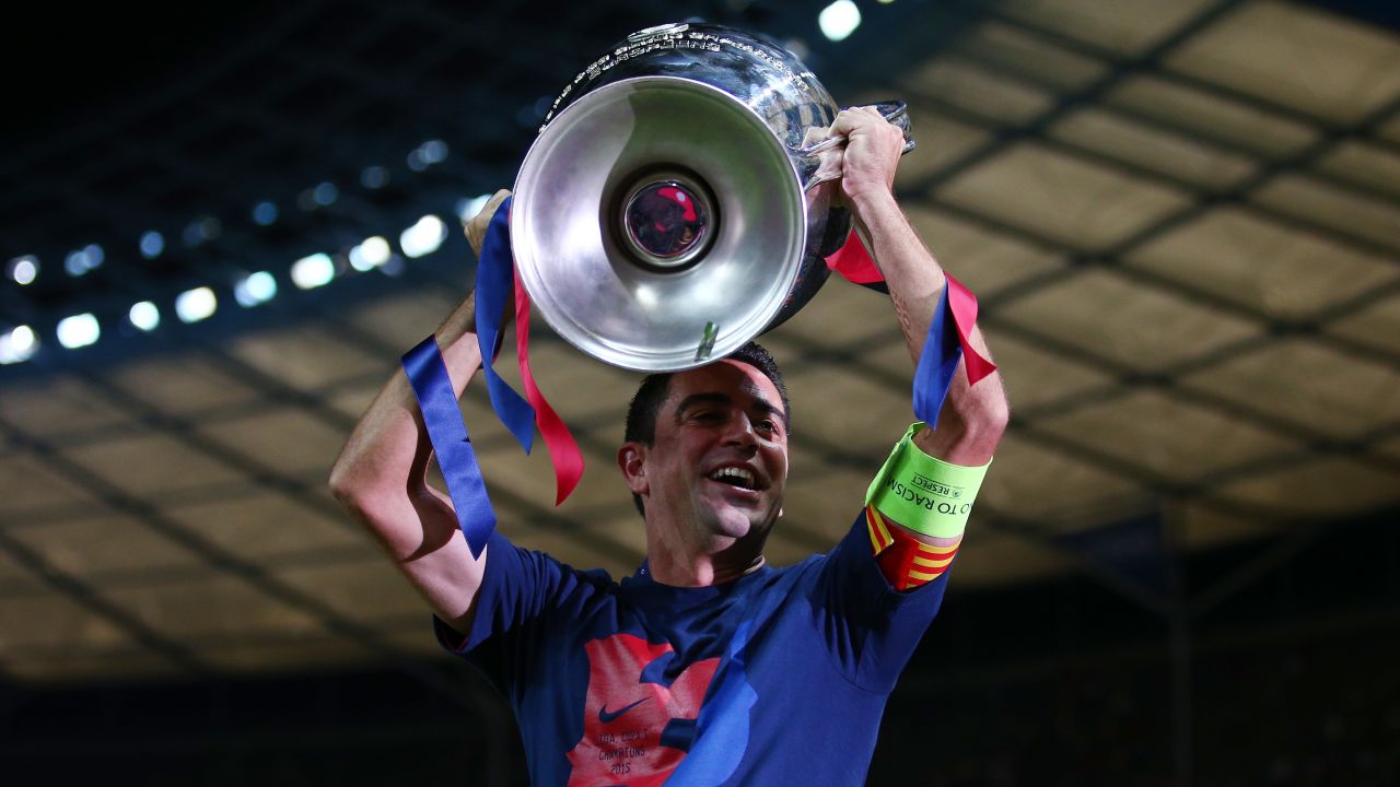Xavi celebrates winning the Champions League with Barcelona in 2015.