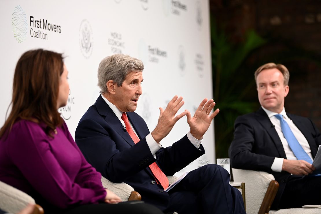 US Special Presidential Envoy on Climate John Kerry, center, speaks at the COP26 summit on Thursday.