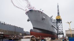 USNS Harvey Milk departs the General Dynamics NASSCO shipyard after a ceremonial address in San Diego, California on November 6, 2021. - One of the first openly gay politicians in the United States, who was assassinated four decades ago, will have a ship named after him this weekend, as the US military looks to keep step with modern-day social attitudes. The USNS Harvey Milk honours a former navy diver who served at a time there was a ban on homosexuality in the armed forces, and who was later shot dead in San Francisco, months after winning public office.