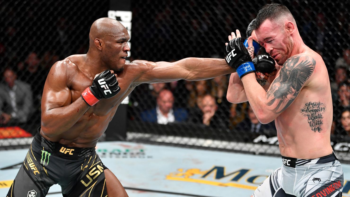 Kamaru Usman of Nigeria punches Colby Covington of the US in their UFC welterweight championship fight during the UFC 268 event at Madison Square Garden.