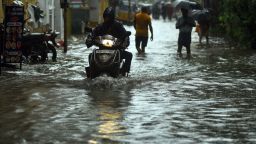 Mandatory Credit: Photo by IDREES MOHAMMED/EPA-EFE/Shutterstock (12592743a)
A motorist makes way through a waterlogged road due to heavy rains, in Chennai, India, 07 November 2021. The India Meteorological Department (IMD) issued a red alert as heavy rains caused by the North-East monsoon for the past 12 hours led to flooding in several areas of Chennai as a low-pressure area forms over the Southeast Bay of Bengal.
Heavy rains and flooding in Chennai, India - 07 Nov 2021