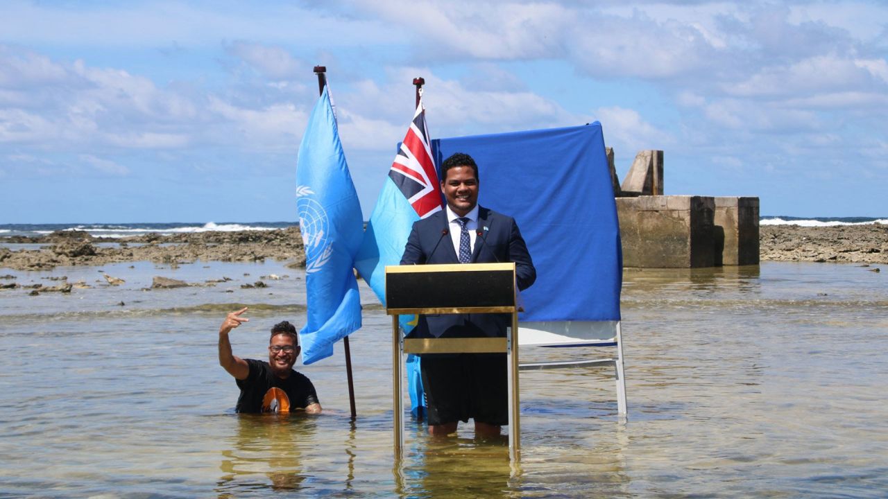 Tuvalu Foreign Minister Simon Kofe gave a recorded address to the COP26 conference in Glasgow in knee-deep seawater.