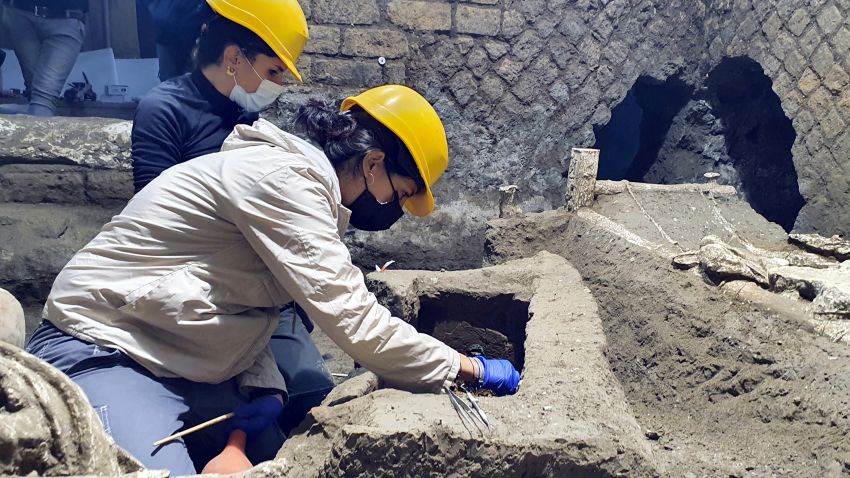Archeologist clean up their latest finding in Pompeii, Italy. Archeologists, excavating a villa amid the ruins of the 79 A.D. volcanic eruption, have discovered a room that served as both a dormitory and storage area, which officials said Saturday offered "a very rare insight the daily life of slaves." Italy's culture minister, Dario Franceschini, said the find was "an important discovery that enriches the knowledge of the daily life of ancient Pompeiians, in particular the level of society still little known."