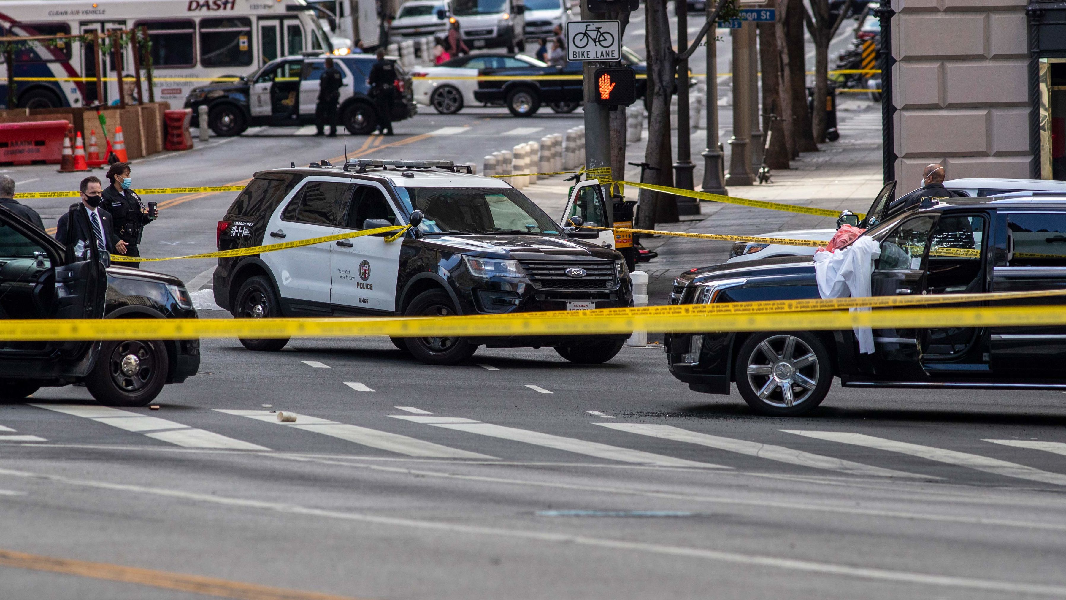 Officers from the Los Angeles Police Department investigate the scene of a shooting on April 27, 2021. Los Angeles was one of the cities named in the CCJ report published Monday.