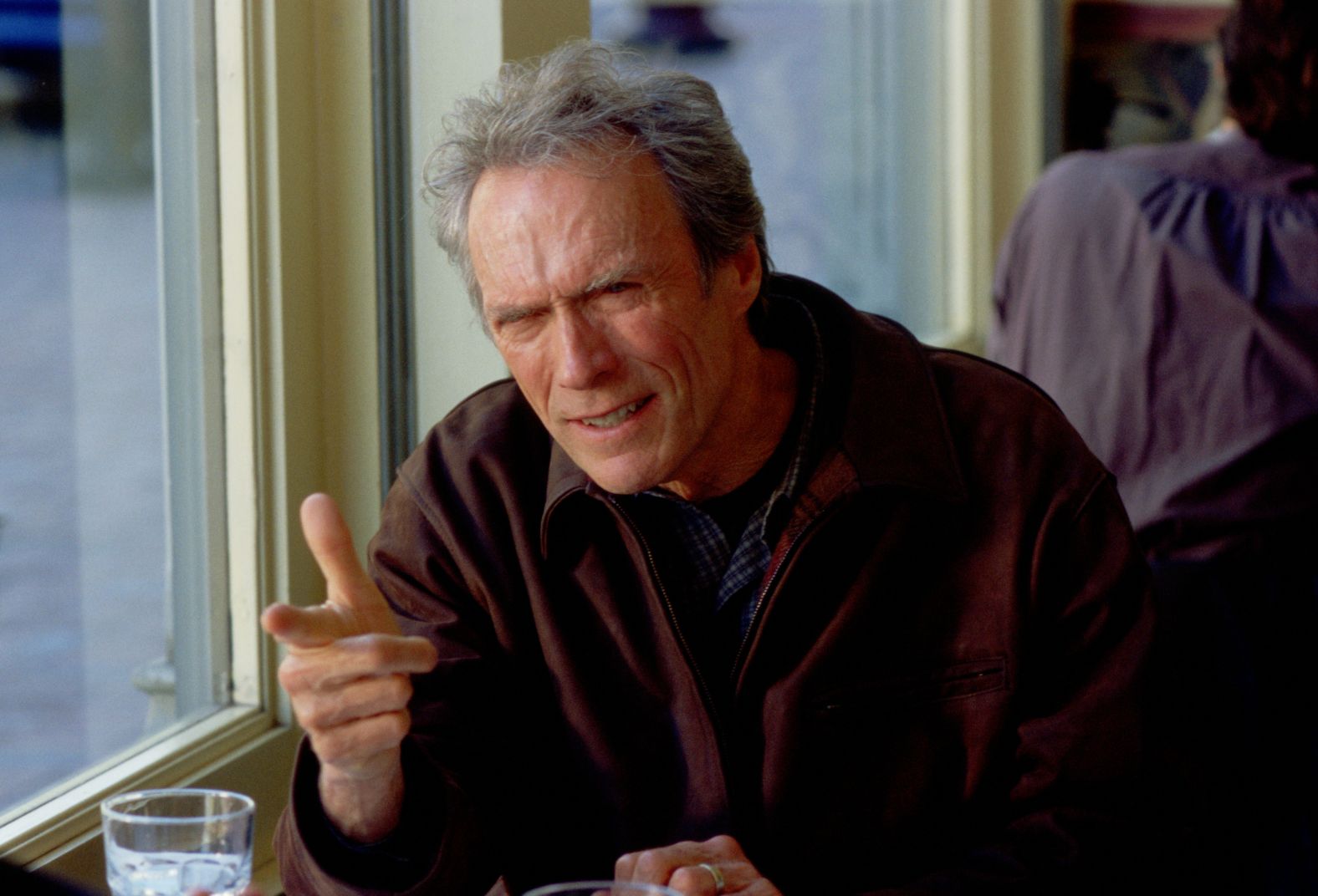 Eastwood balanced his screen contributions between acting, directing, composing and producing. Here he's working on "True Crime" (1999).
