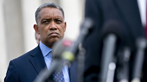 In this Sept. 9, 2019, file photo, Karl Racine, the District of Columbia attorney general, listens during a news conference outside the Supreme Court in Washington. 
