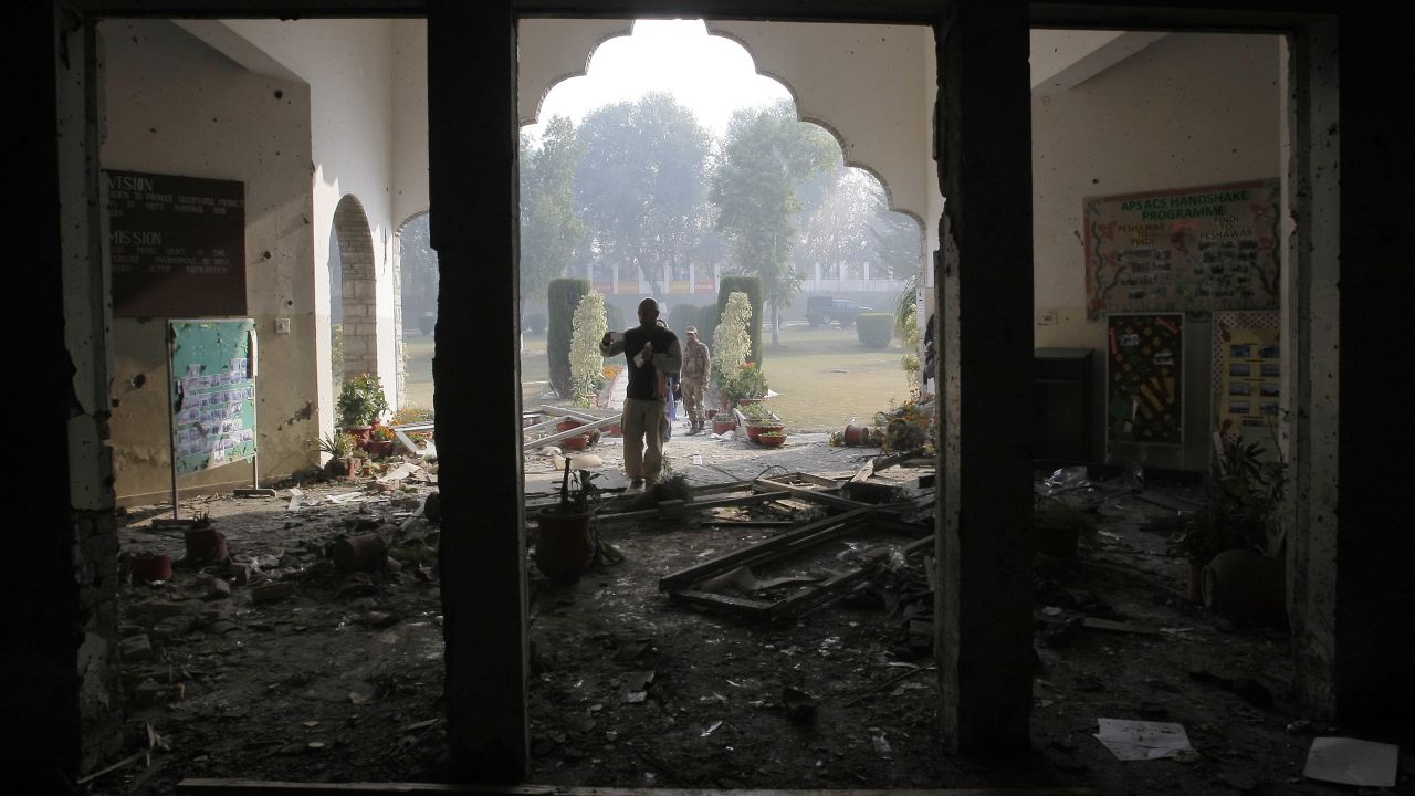 A file photo shows a Pakistan army soldier inspecting the Army Public School that was attacked by militants, in Peshawar, Pakistan on December 17, 2014. 