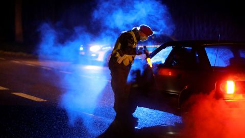 Military police conduct checks on vehicles near the border on Monday night.