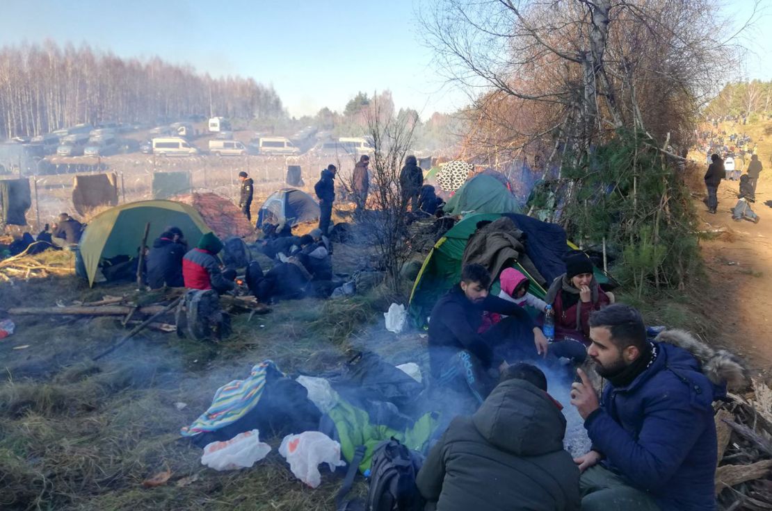 Temperatures dropped below zero overnight Tuesday as migrants camped out on the border of Belarus with Poland. 