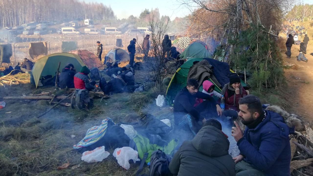 Temperatures dropped below zero overnight Tuesday as migrants camped out on the border of Belarus with Poland.