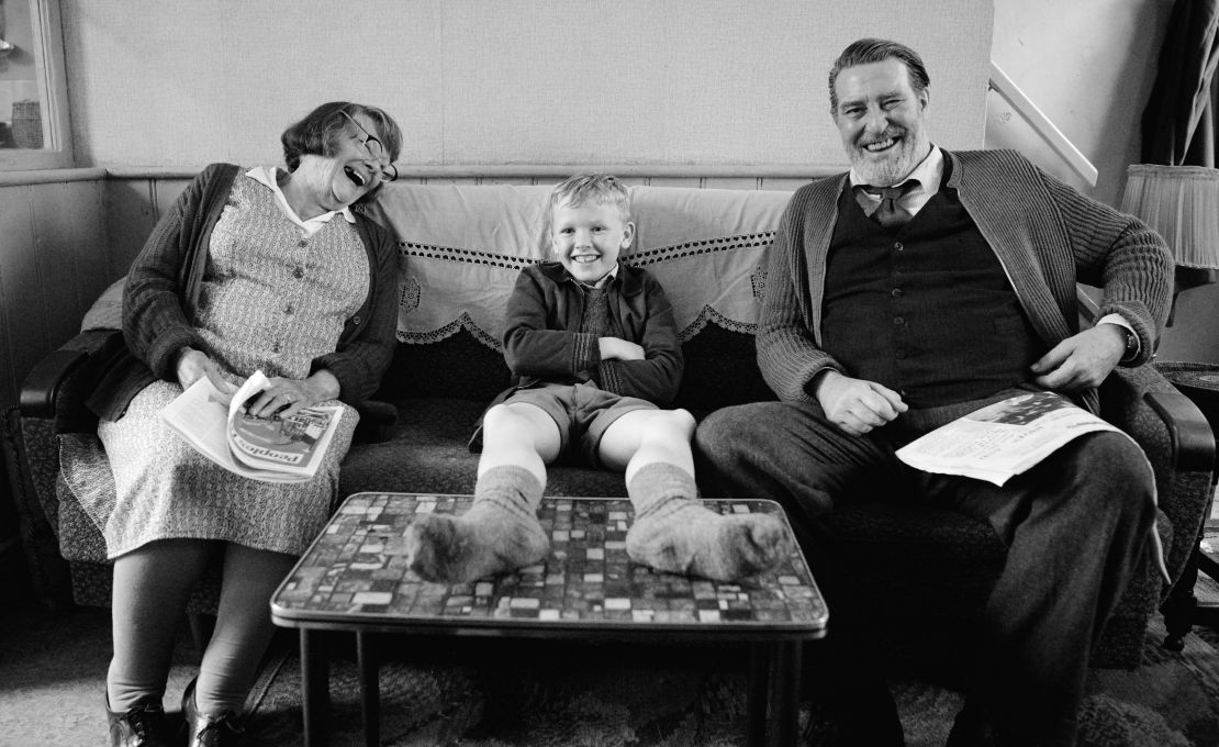(From left) Judi Dench as Granny, Jude Hill as Buddy, and Ciarán Hinds as Pop in director Kenneth Branagh's "Belfast."